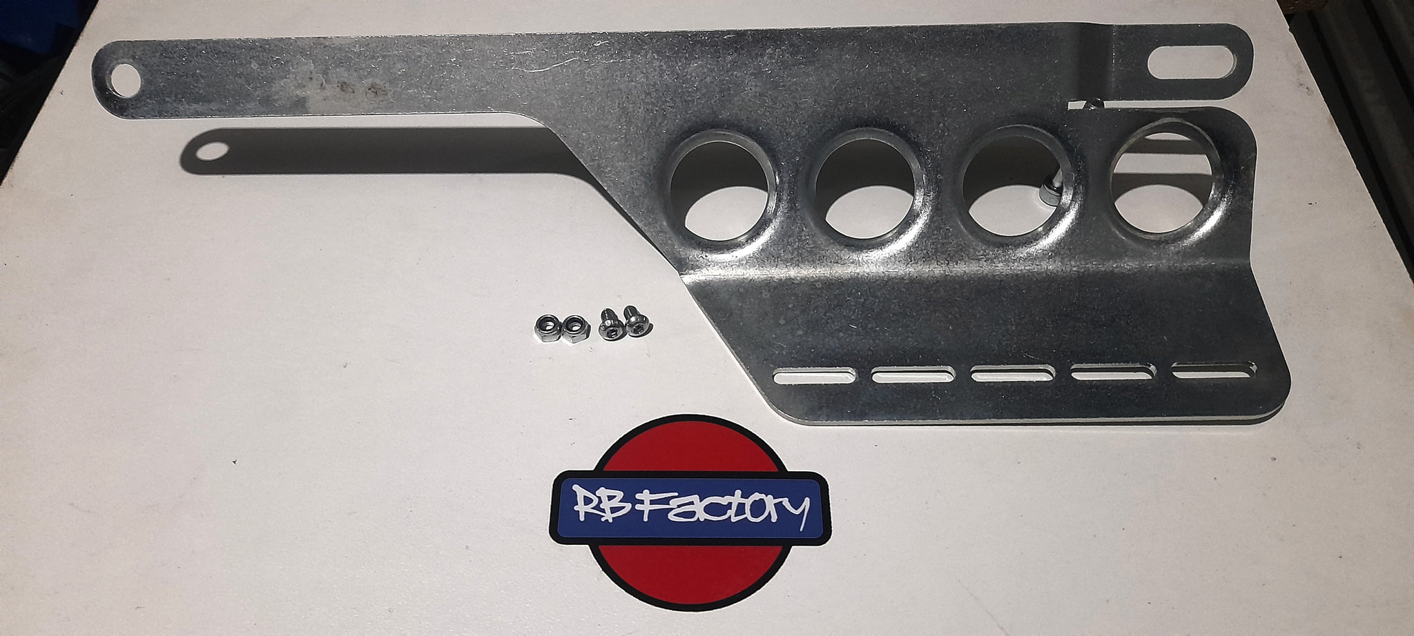 R32 R33 dimple die fire extinguisher mount - Passengers side